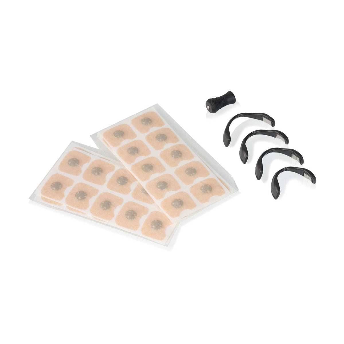 Inhalt des Magnetic Nasal Dilator Starterkits mit Nasenpflastern und magnetischen Dilatatoren in mehreren Größen.